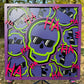 Defaced Stacked Skull - Purple/White